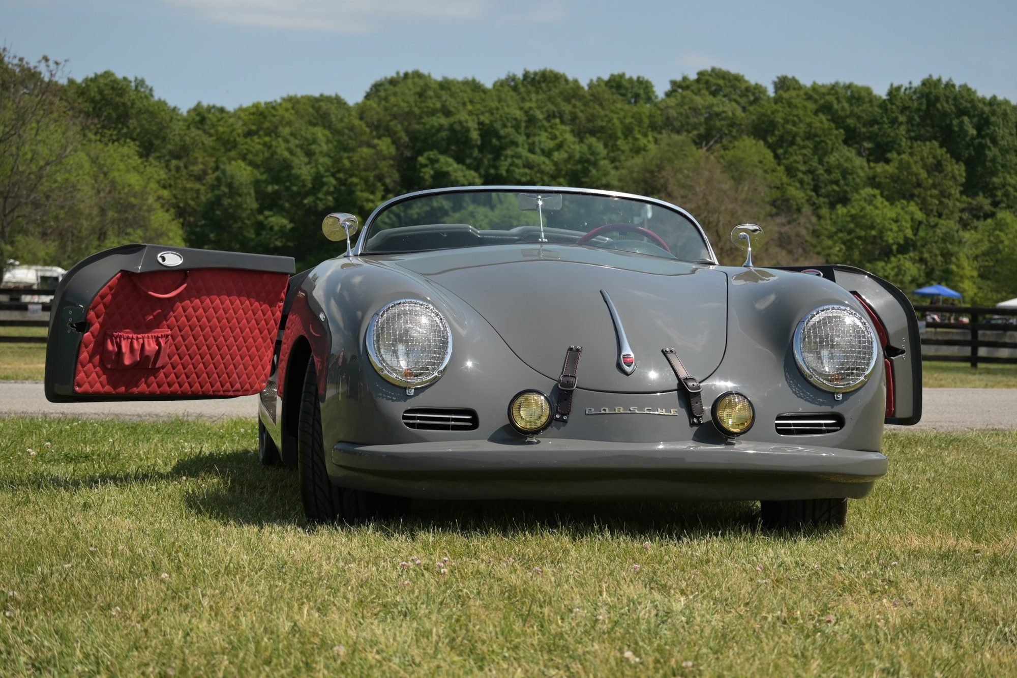 Grey Porsche Speedster with red quilted doors open, available as a classic wedding photo prop and getaway car in Virginia